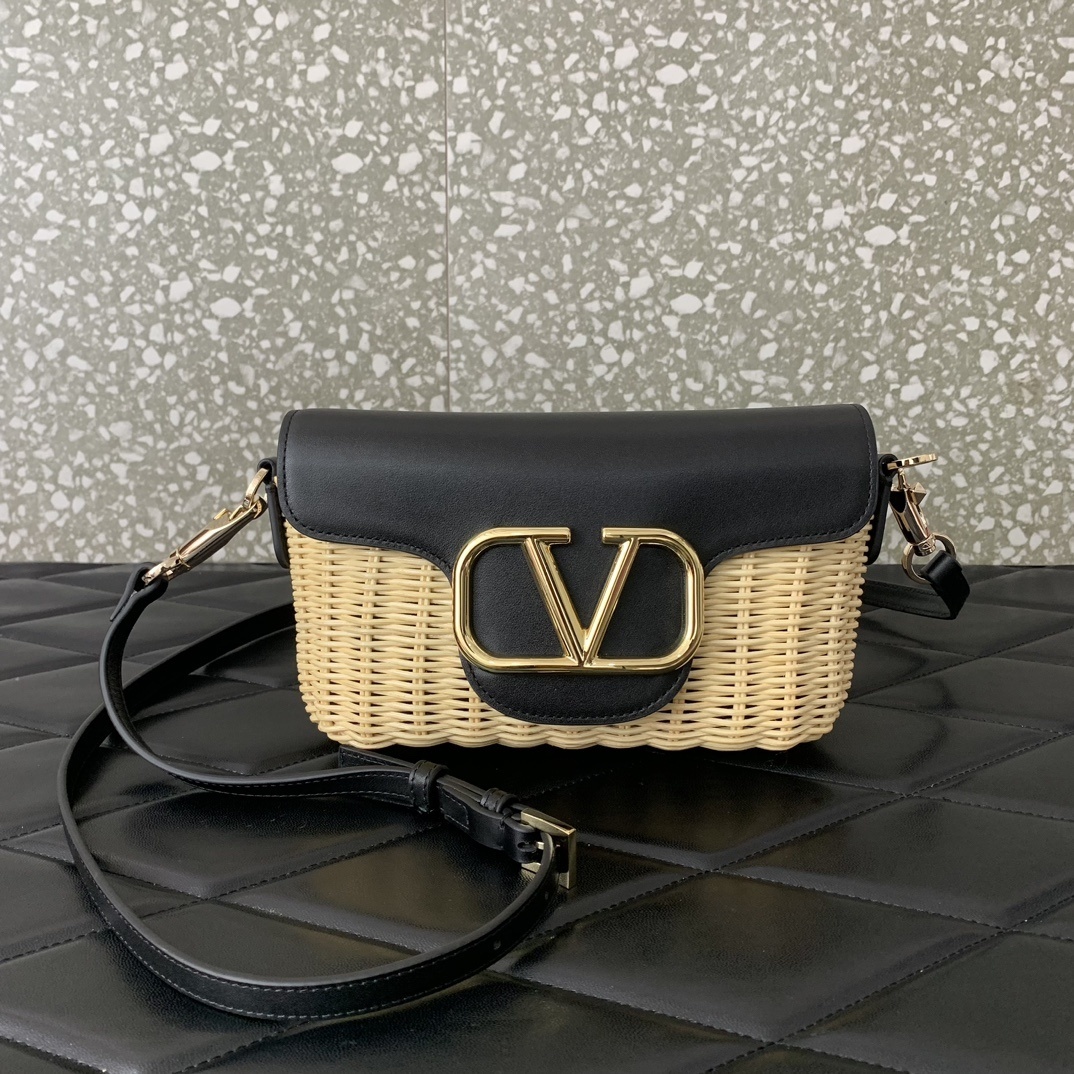 Valentino Garavani Locò straw shoulder bag featuring a VLogo Signature metallic element