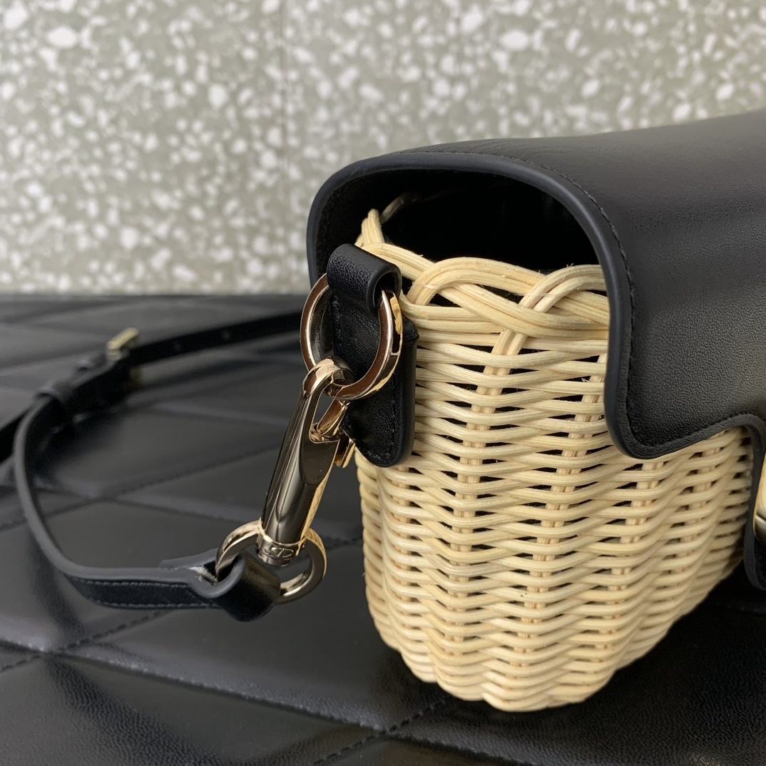 Valentino Garavani Locò straw shoulder bag featuring a VLogo Signature metallic element