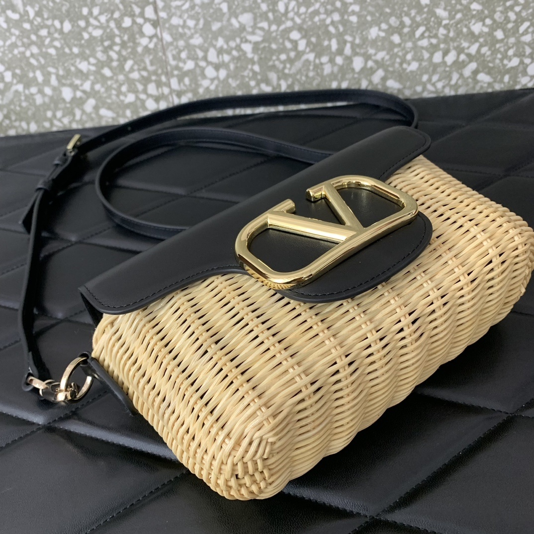 Valentino Garavani Locò straw shoulder bag featuring a VLogo Signature metallic element