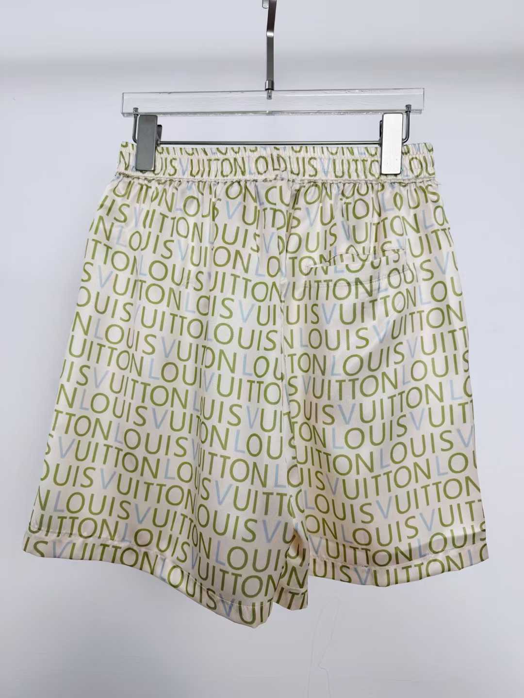 LV men's shorts featuring a signature monogram pattern