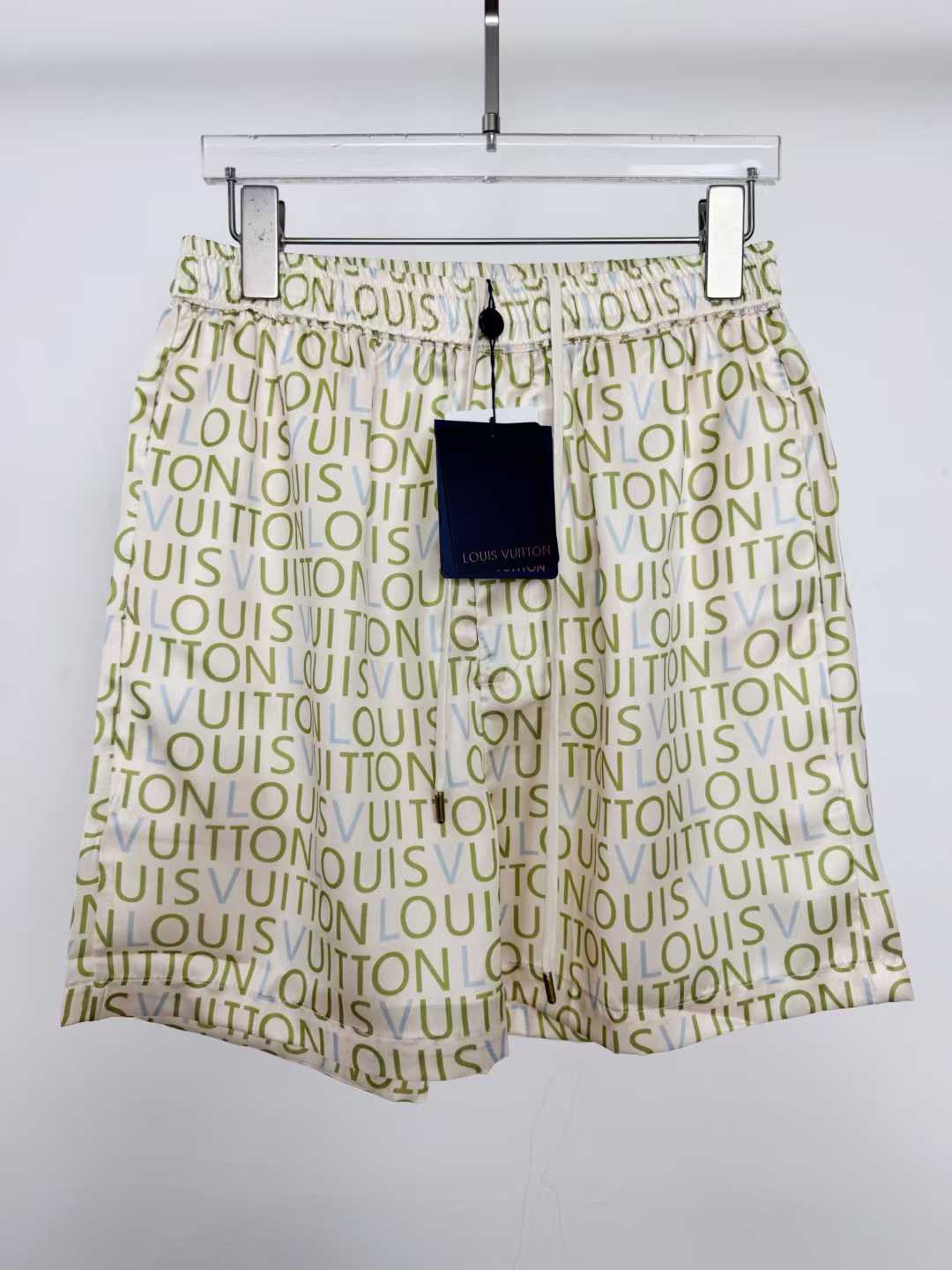 LV men's shorts featuring a signature monogram pattern