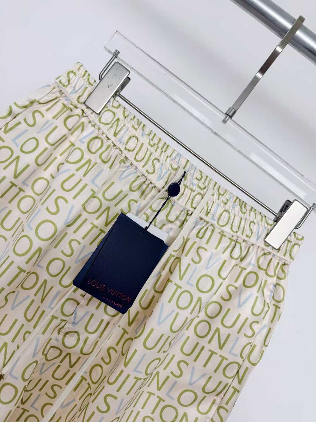 LV men's shorts featuring a signature monogram pattern