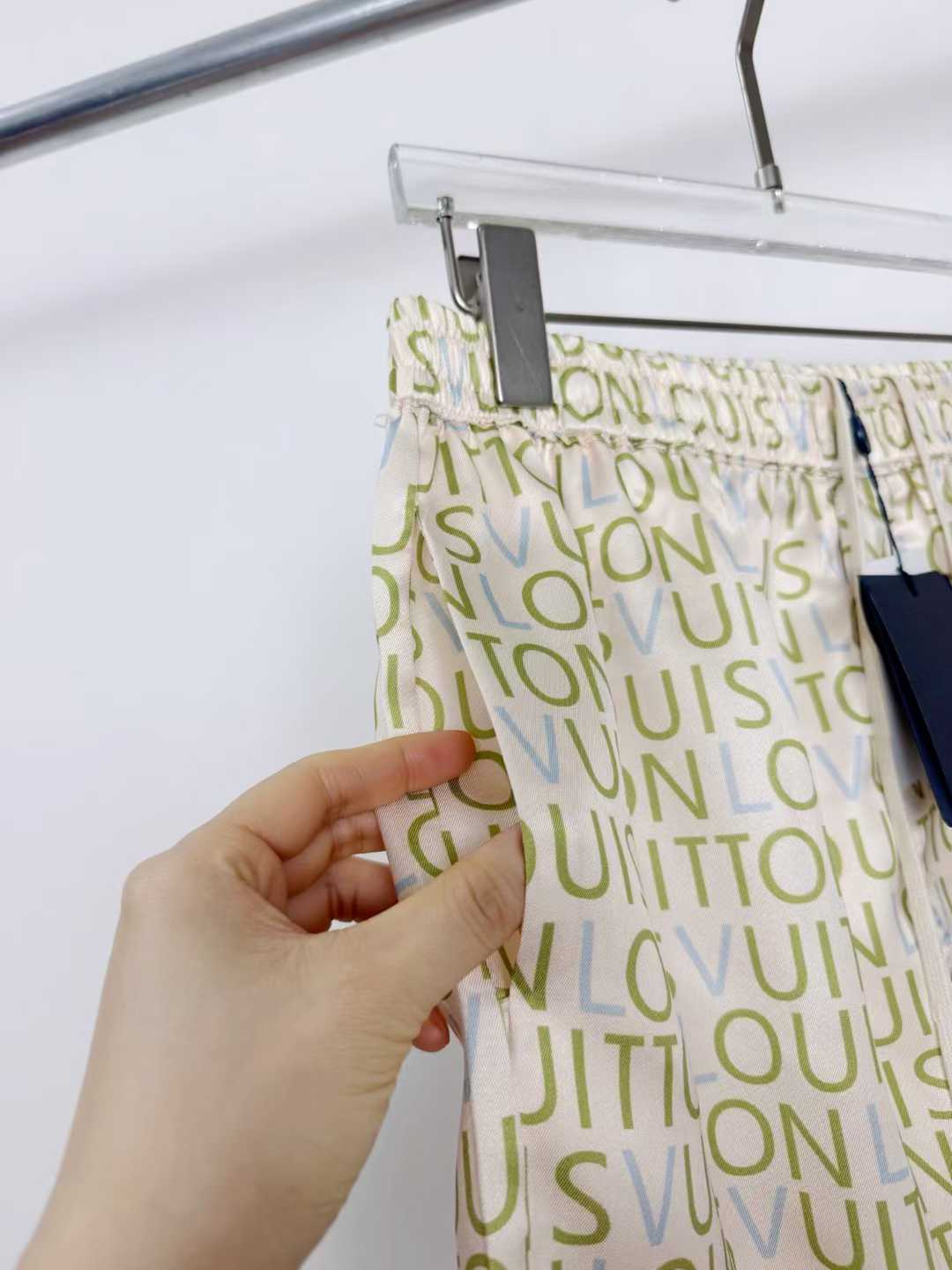 LV men's shorts featuring a signature monogram pattern