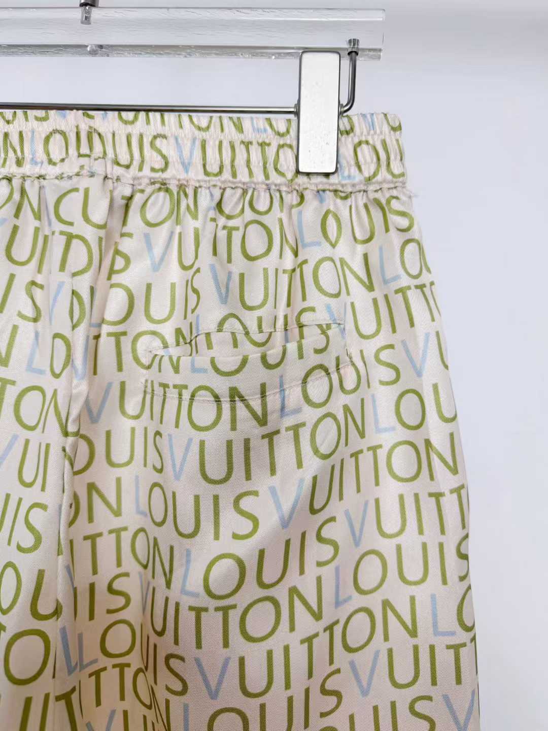 LV men's shorts featuring a signature monogram pattern