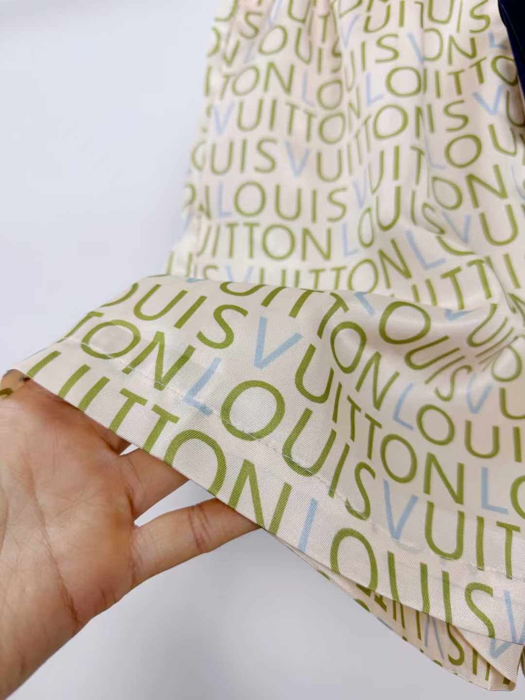 LV men's shorts featuring a signature monogram pattern