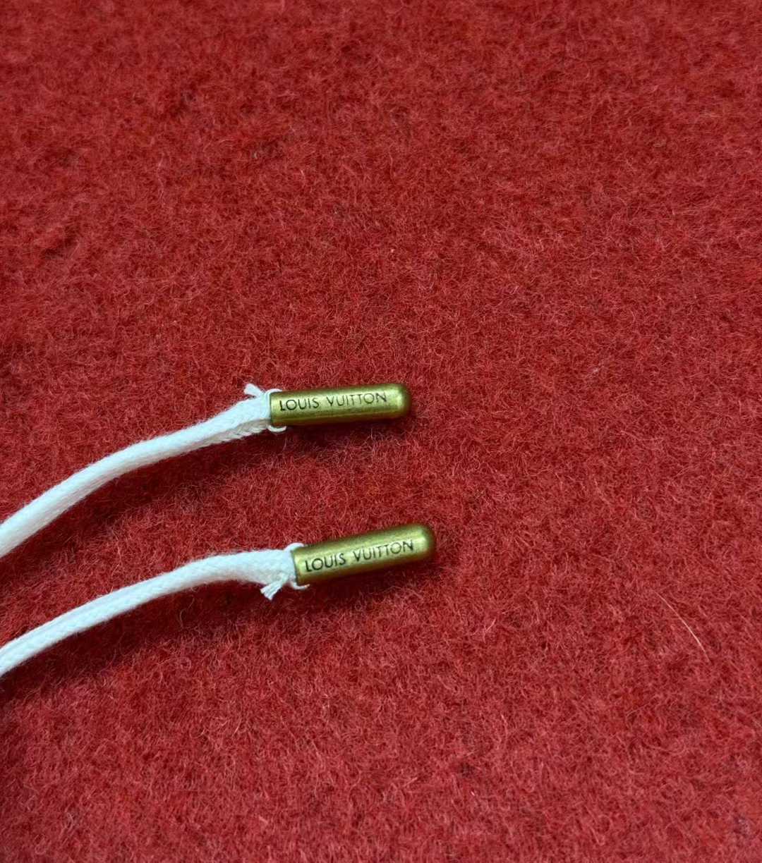 LV men's shorts featuring a signature monogram pattern