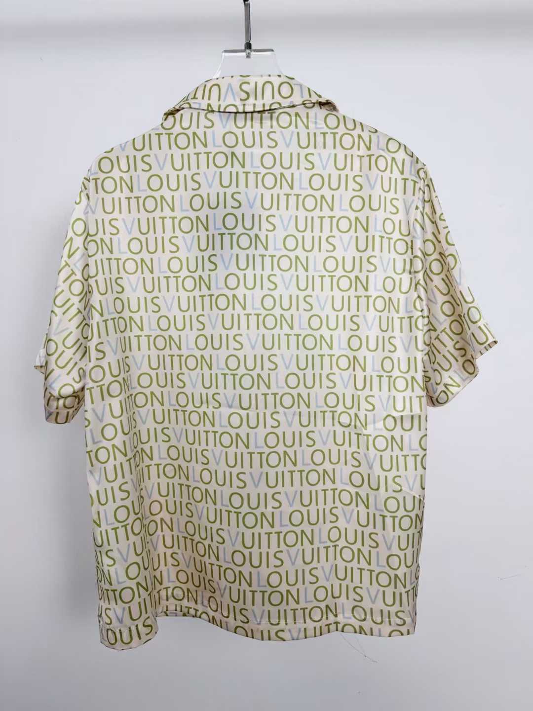 LV monogram short-sleeved shirt is a luxury item featuring an all-over print of the brand's name