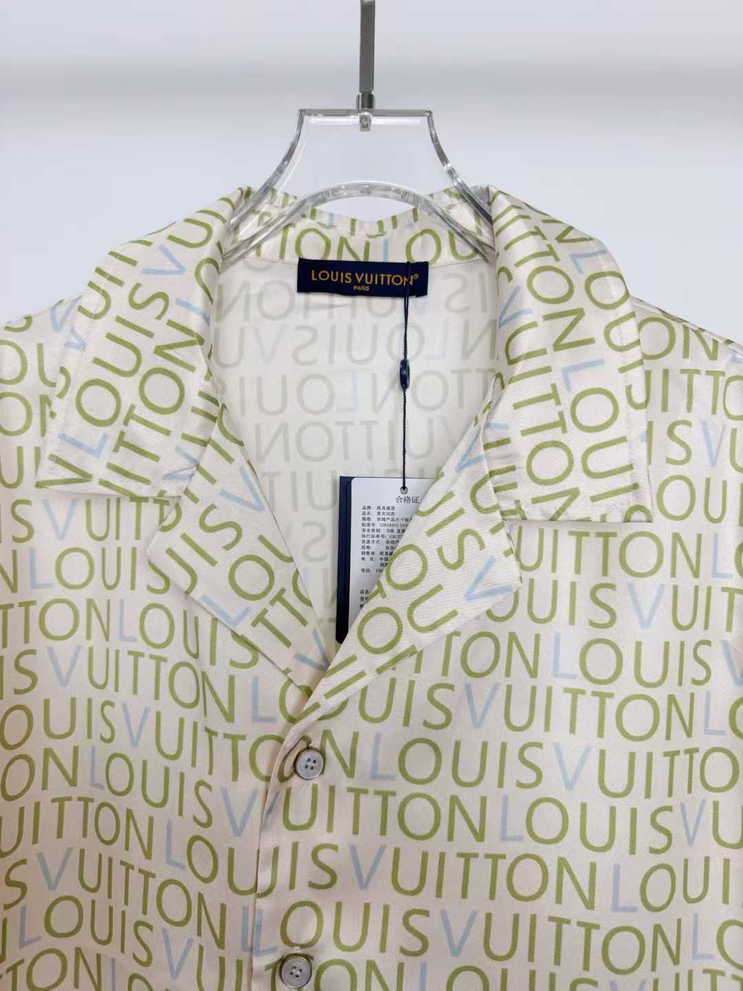 LV monogram short-sleeved shirt is a luxury item featuring an all-over print of the brand's name