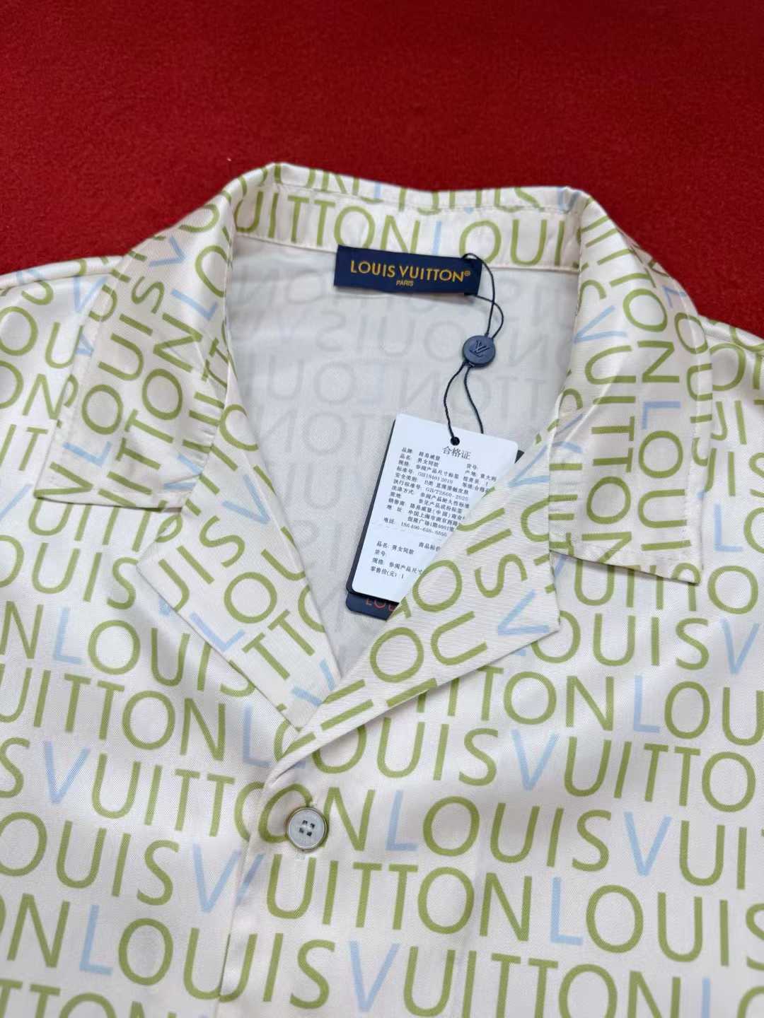LV monogram short-sleeved shirt is a luxury item featuring an all-over print of the brand's name