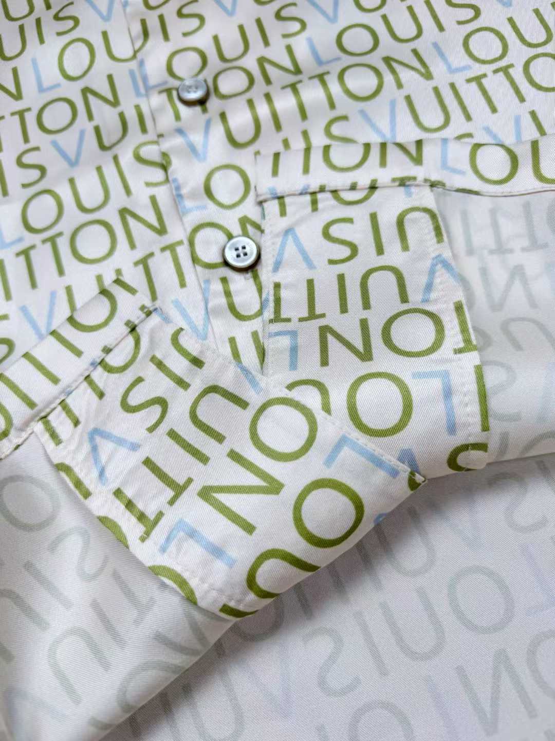 LV monogram short-sleeved shirt is a luxury item featuring an all-over print of the brand's name