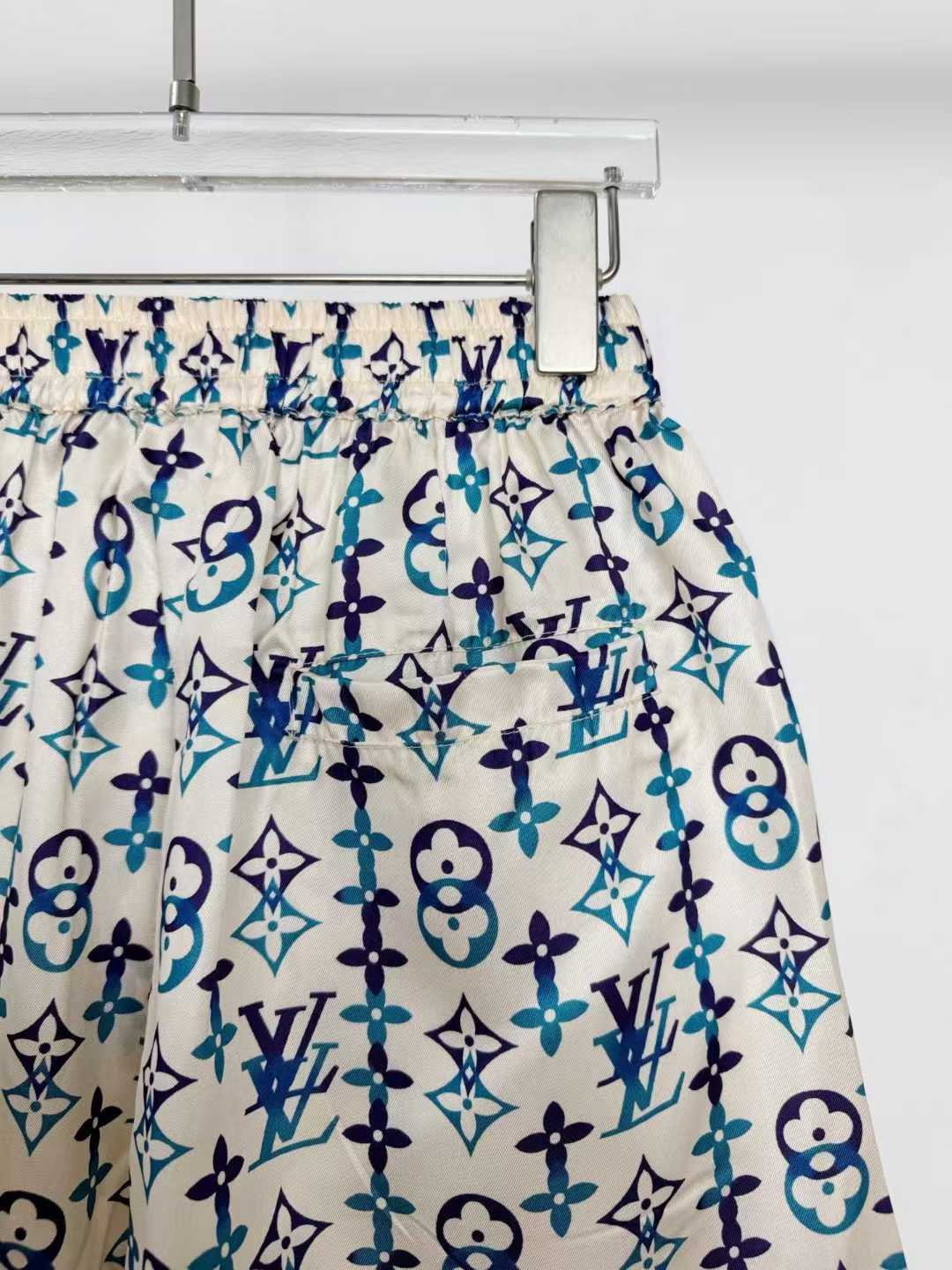 LV silk monogram shorts featuring a distinctive blue and white pattern