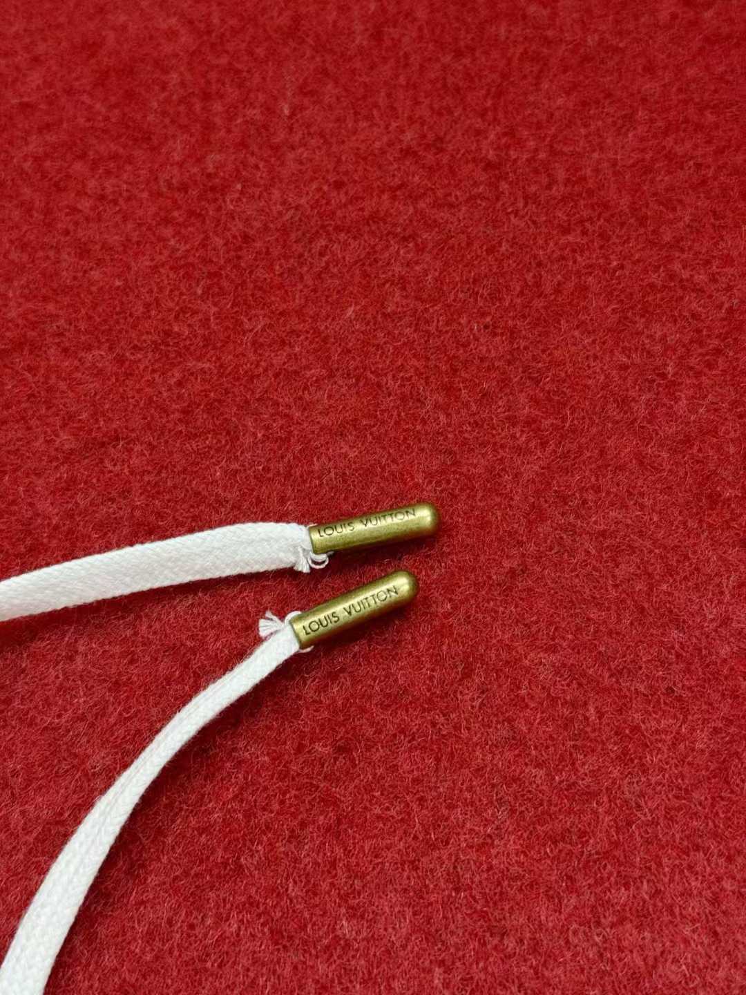 LV silk monogram shorts featuring a distinctive blue and white pattern