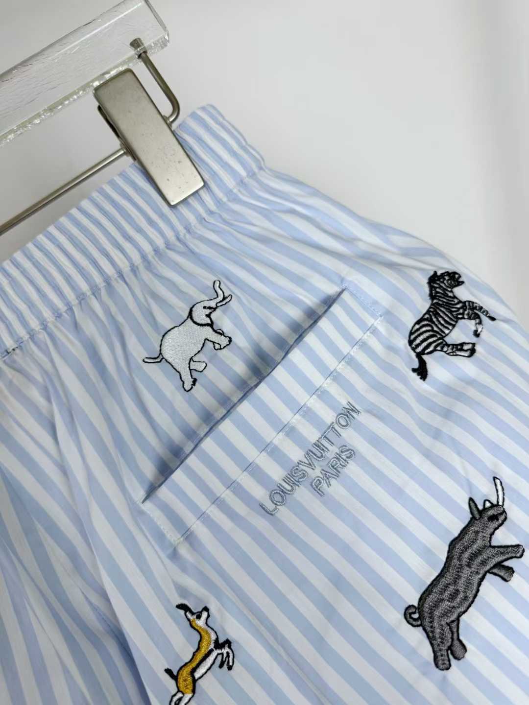 LV x The Darjeeling Limited Embroidered Striped Shorts from the Louis Vuitton Men's Spring-Summer 2026 collection