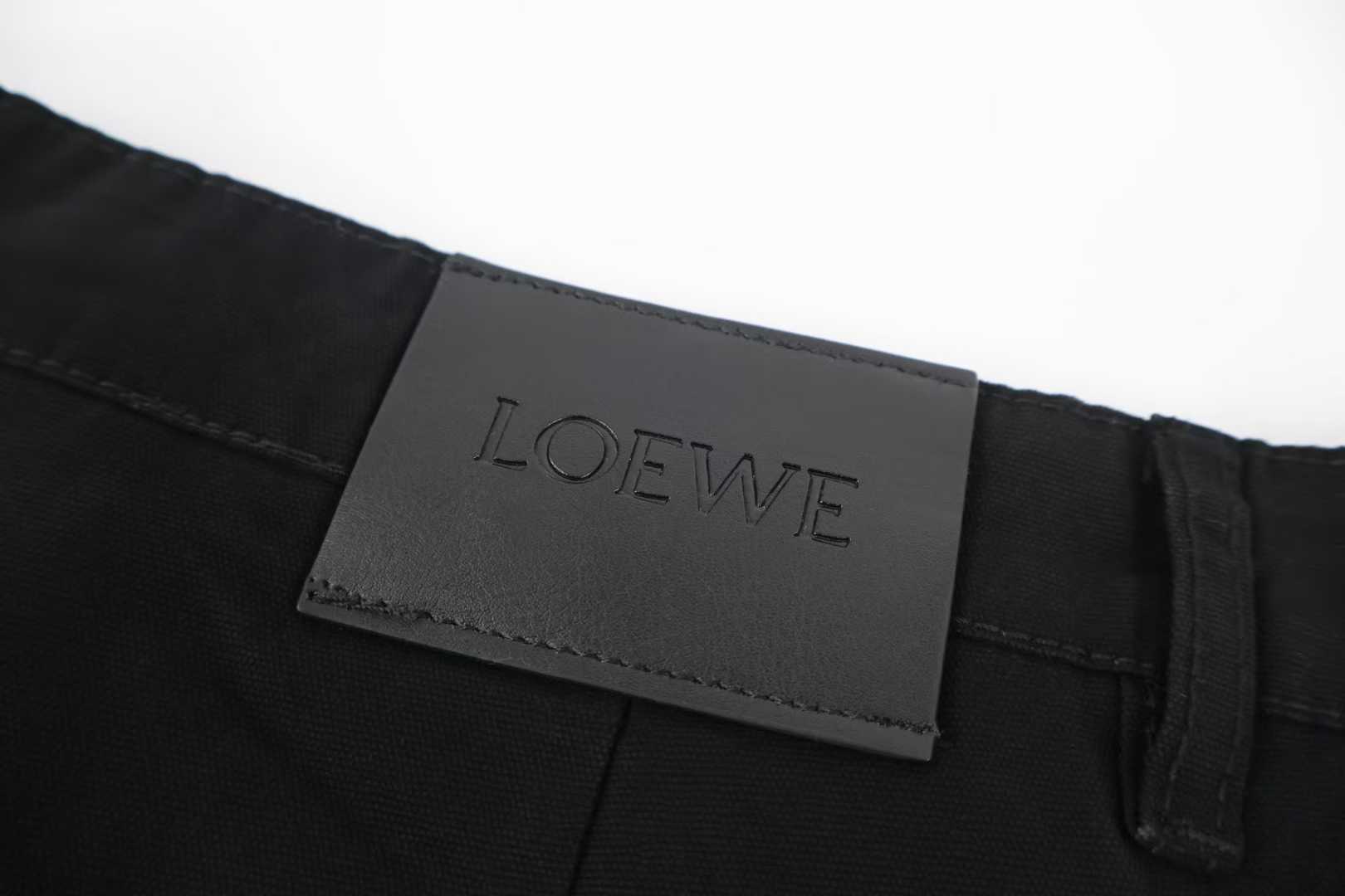 Loewe x Louis Wain embroidered wide-leg jeans in black, featuring playful animal appliqués inspired by the British artist's "Futurist Cats" series