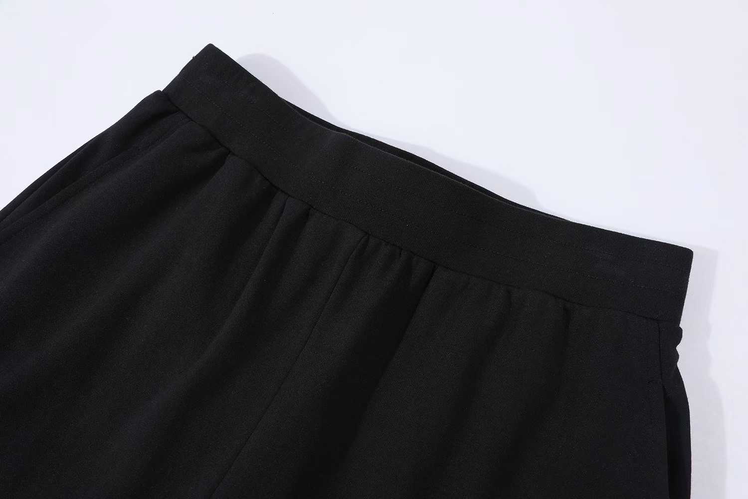 LV Embellished Jersey Shorts featuring a tone-on-tone iridescent rhinestone LV signature on the leg