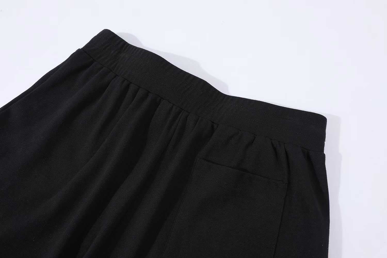 LV Embellished Jersey Shorts featuring a tone-on-tone iridescent rhinestone LV signature on the leg