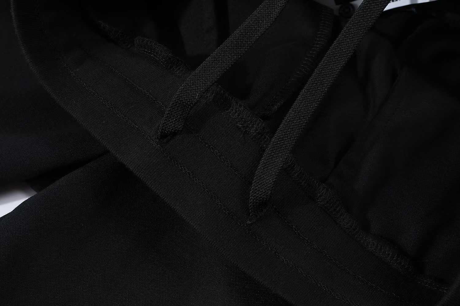 LV Embellished Jersey Shorts featuring a tone-on-tone iridescent rhinestone LV signature on the leg