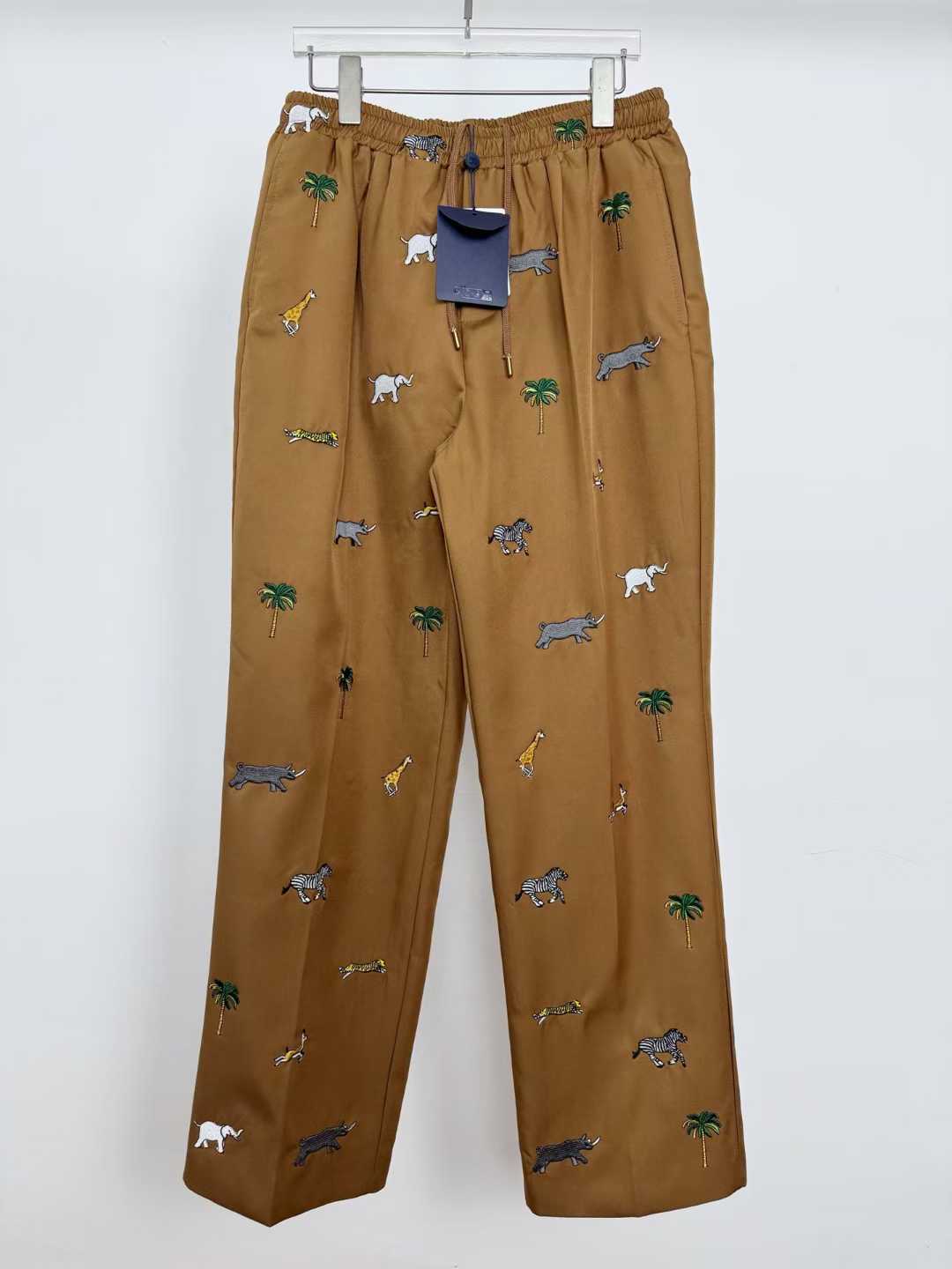LV x The Darjeeling Limited Fil Coupe drawstring pants featuring an all-over motif