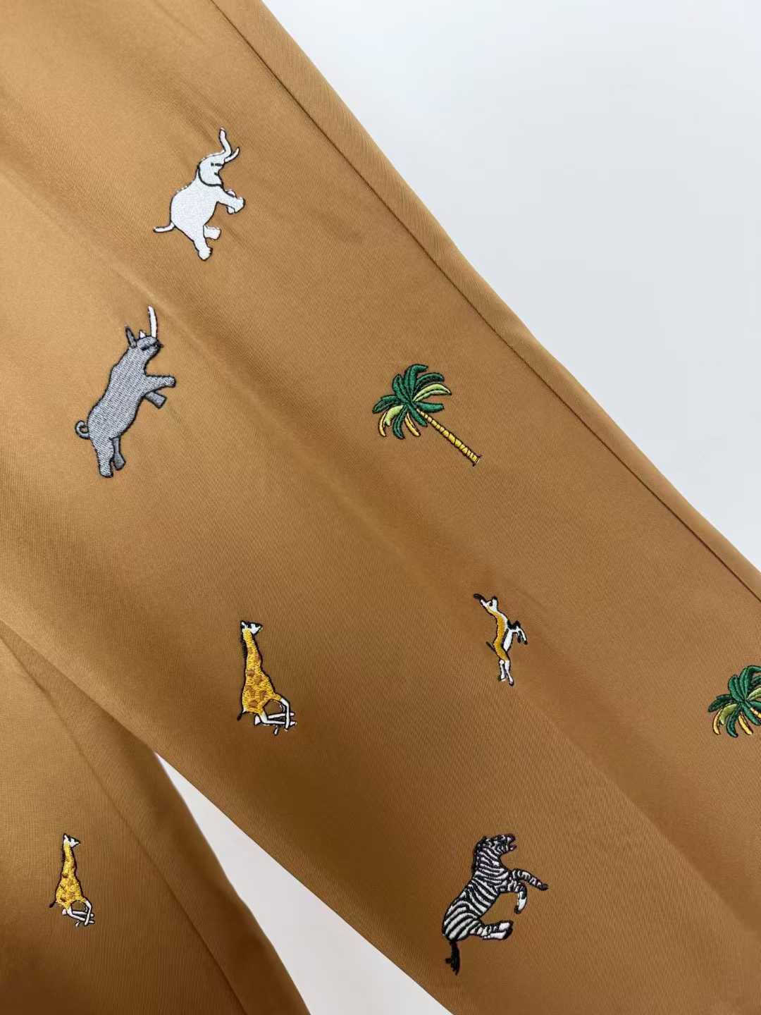 LV x The Darjeeling Limited Fil Coupe drawstring pants featuring an all-over motif