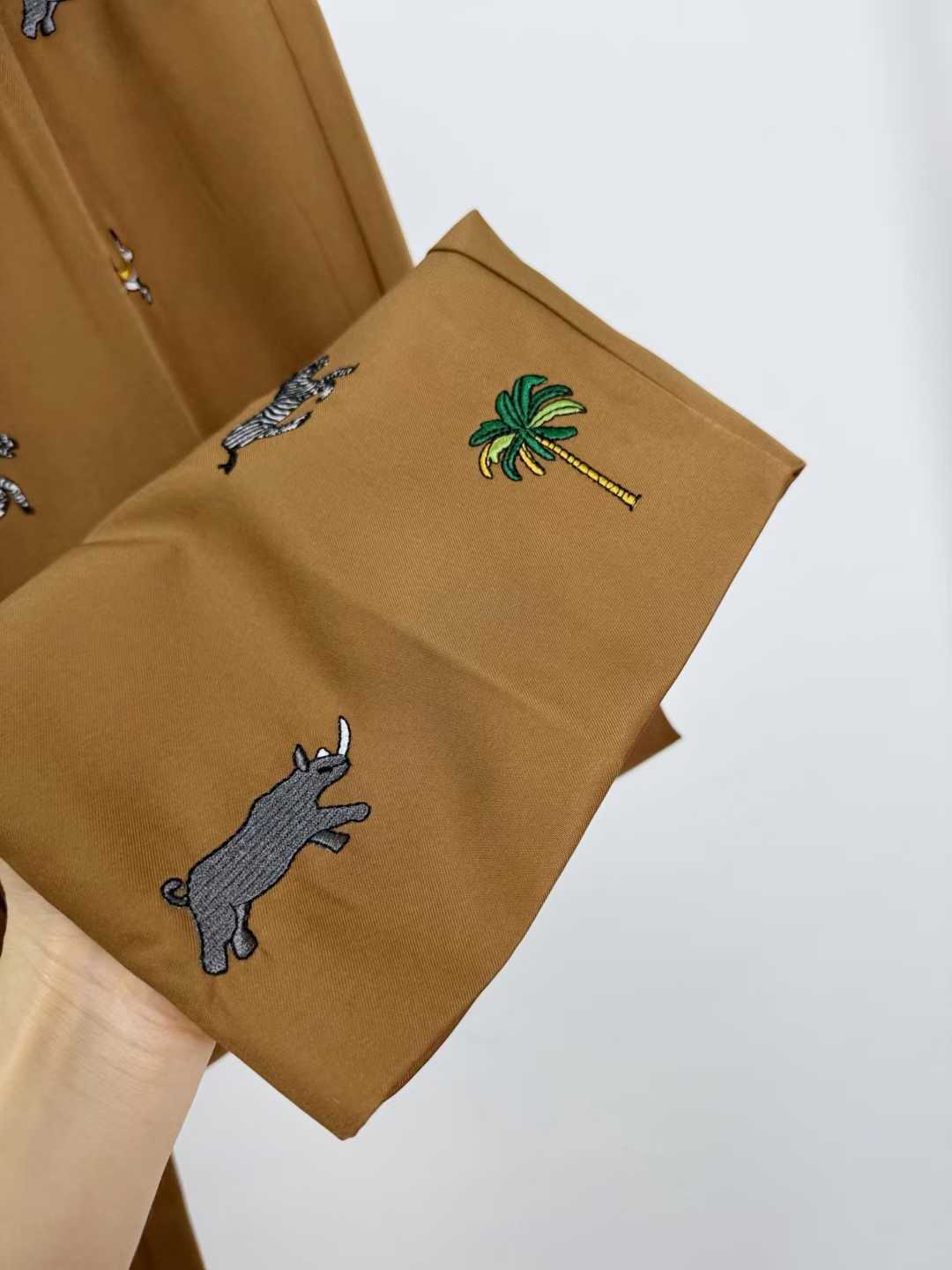 LV x The Darjeeling Limited Fil Coupe drawstring pants featuring an all-over motif