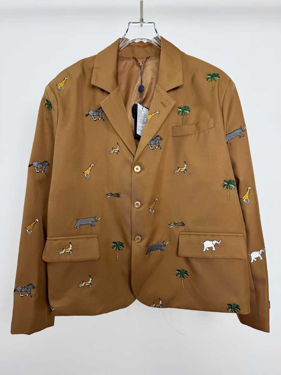 LV x The Darjeeling Limited Single-Breasted Jacket in caramel wool, featuring an all-over fil coupé jacquard motif of flora and fauna