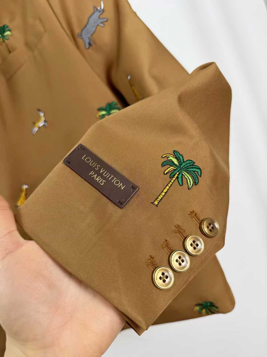 LV x The Darjeeling Limited Single-Breasted Jacket in caramel wool, featuring an all-over fil coupé jacquard motif of flora and fauna