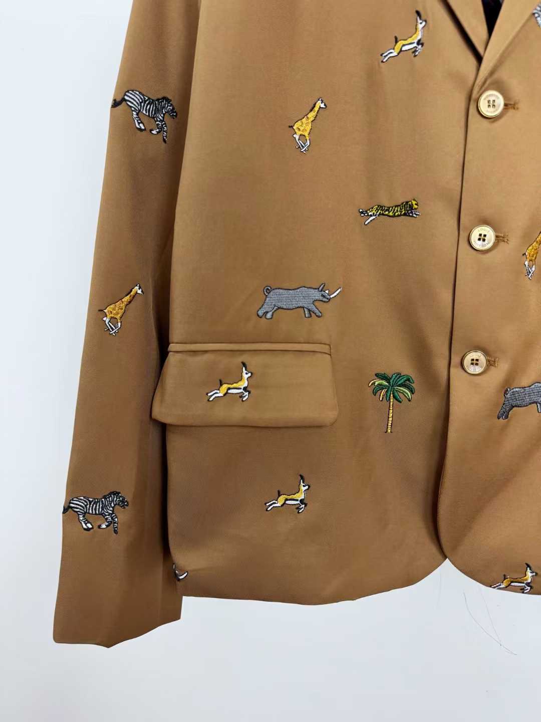 LV x The Darjeeling Limited Single-Breasted Jacket in caramel wool, featuring an all-over fil coupé jacquard motif of flora and fauna