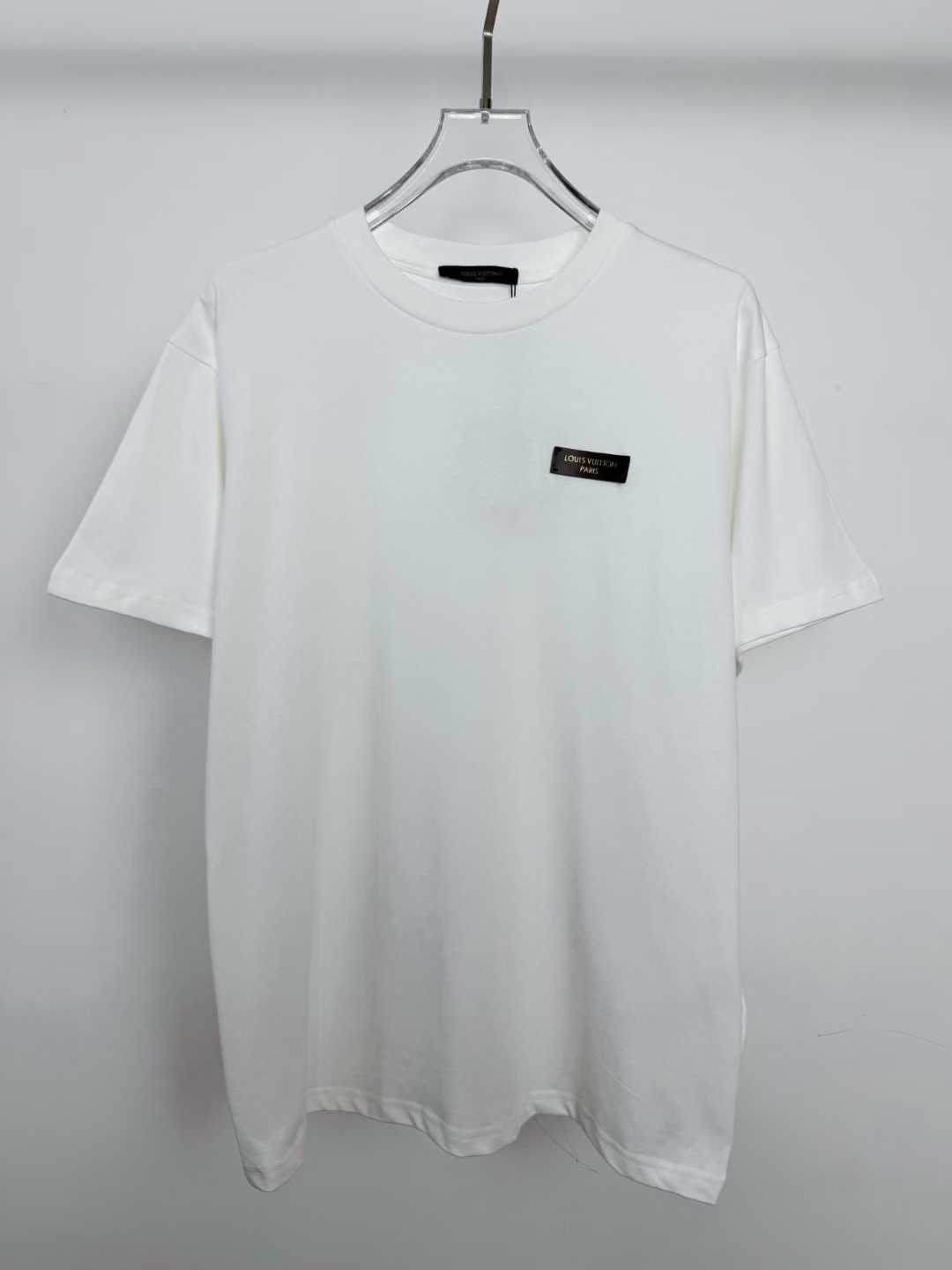 LV white cotton T-shirt featuring a branded metal logo plaque on the chest