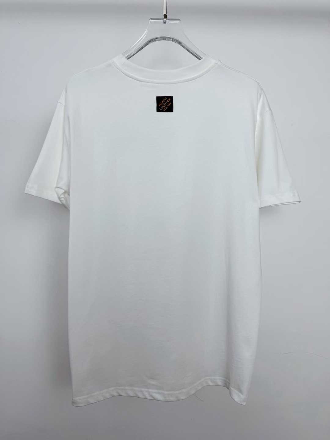 LV white cotton T-shirt featuring a branded metal logo plaque on the chest