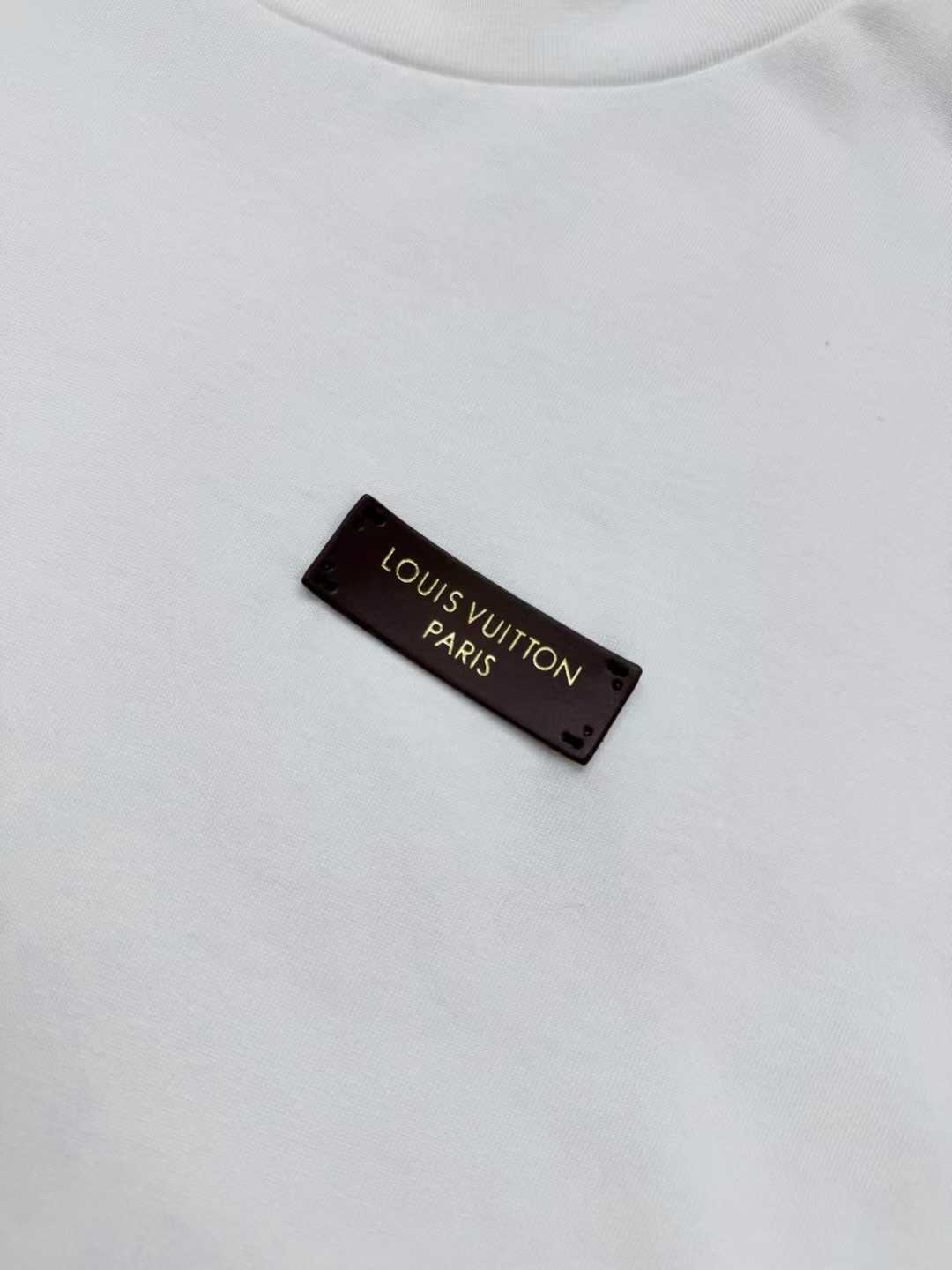 LV white cotton T-shirt featuring a branded metal logo plaque on the chest