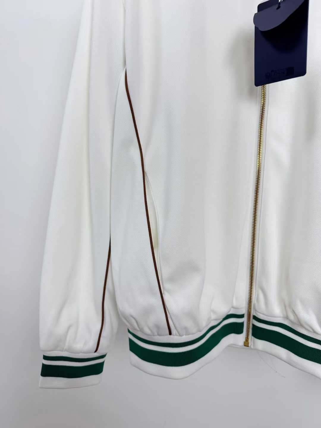 LV white and green bomber track jacket with gold zipper details