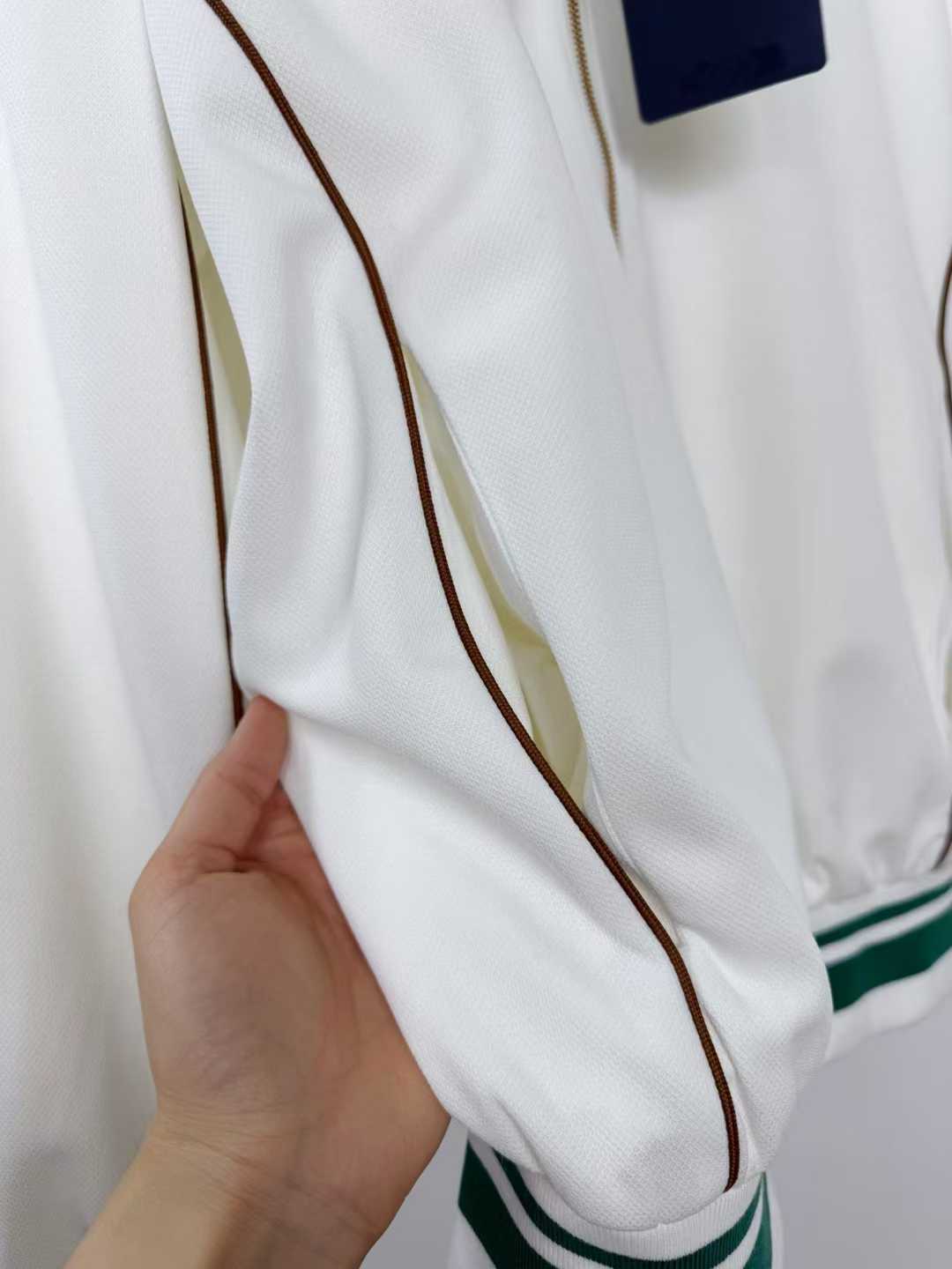 LV white and green bomber track jacket with gold zipper details