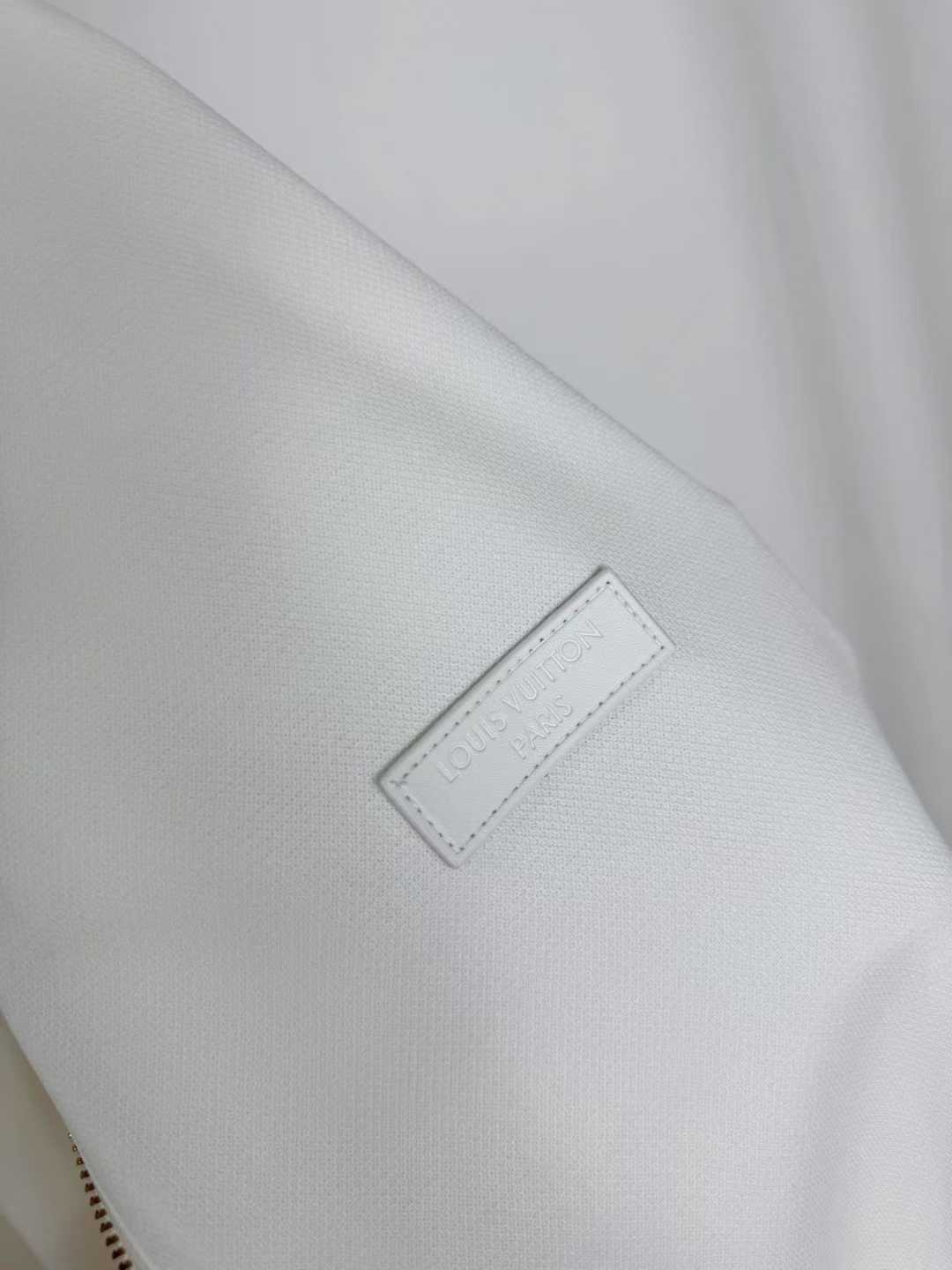 LV white and green bomber track jacket with gold zipper details