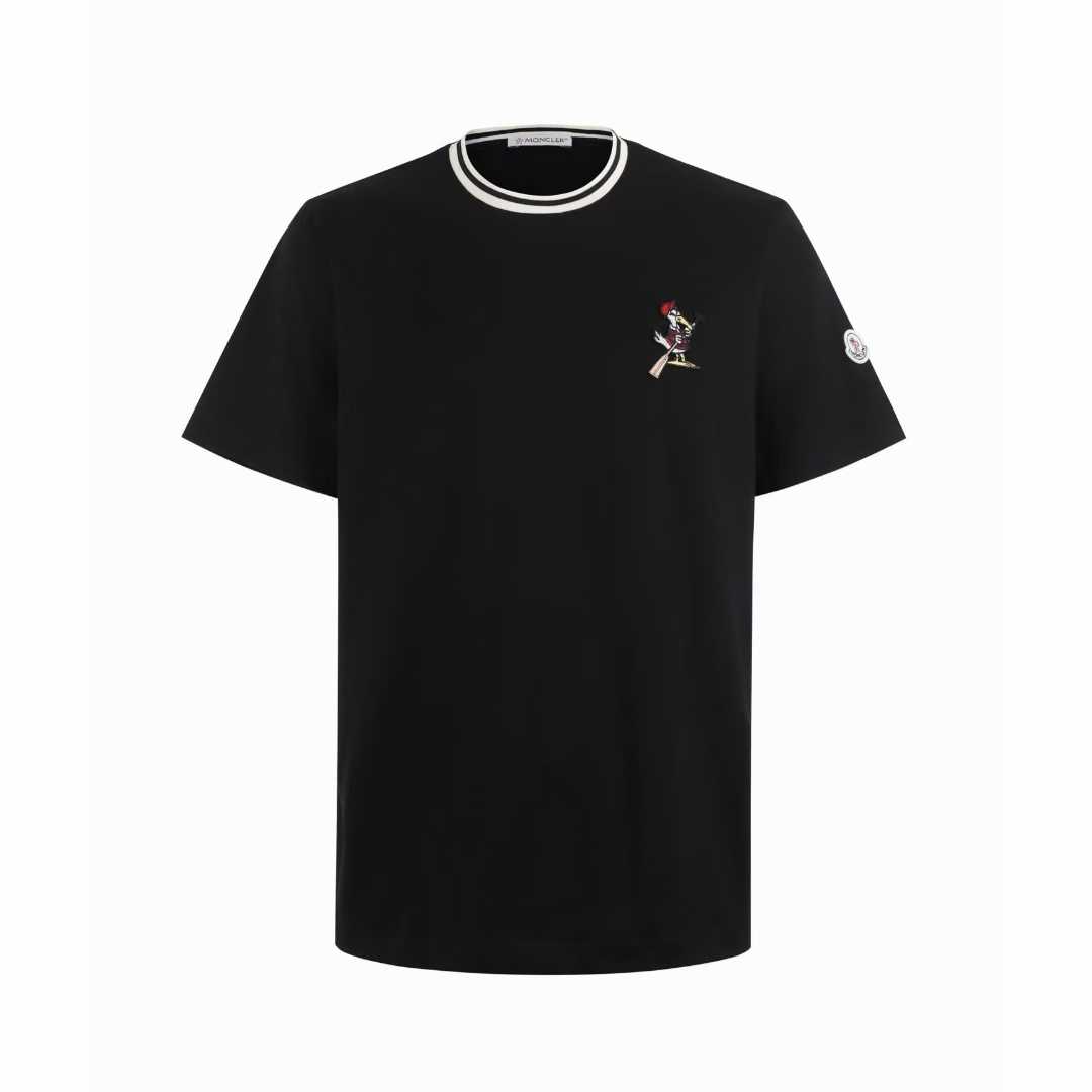 Moncler Striped-Trim Detail-Appliqué T-Shirt is a luxury cotton jersey crewneck featuring a distinctive mascotte logo patch on the chest and striped detailing on the neckline