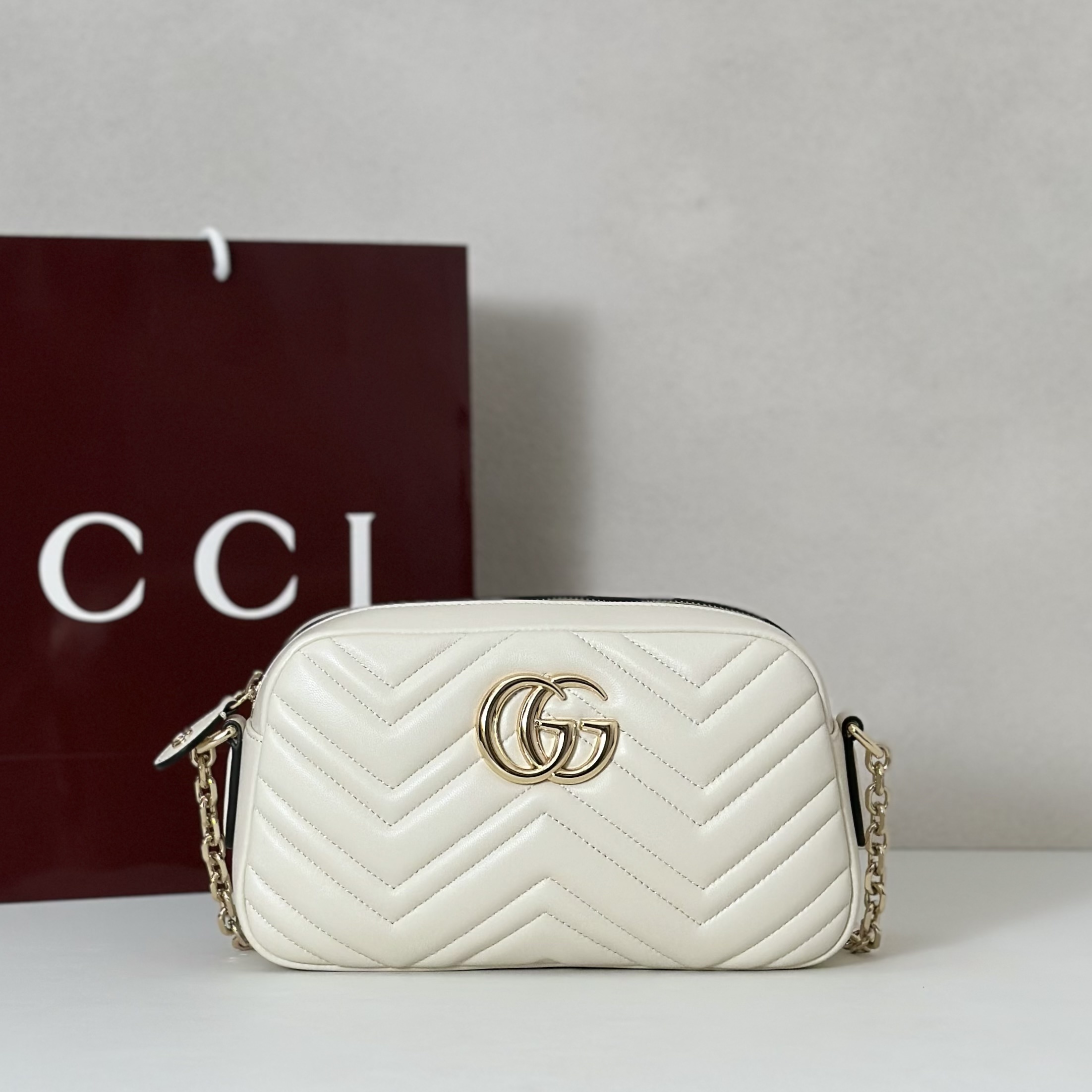Gucci GG Marmont Matelassé Small Camera Bag in white leather